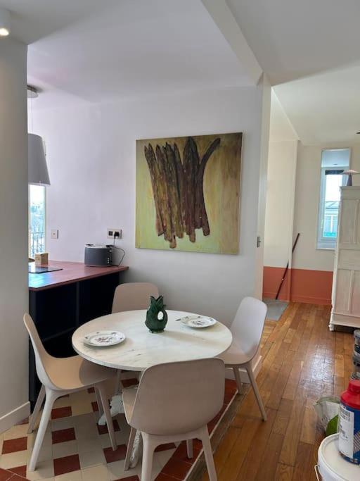 Un Fabuleux Decor Pour Un Chaleureux Appartement Париж Екстериор снимка